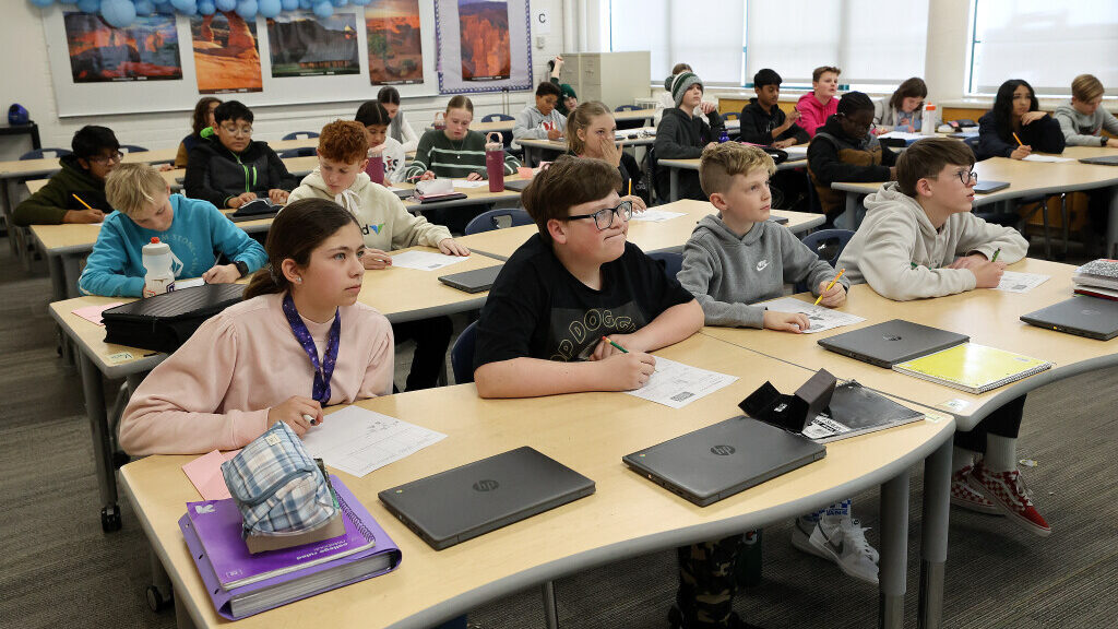 Sixth grade students listen to their teacher during Utah studies class at Evergreen Junior High Sch...