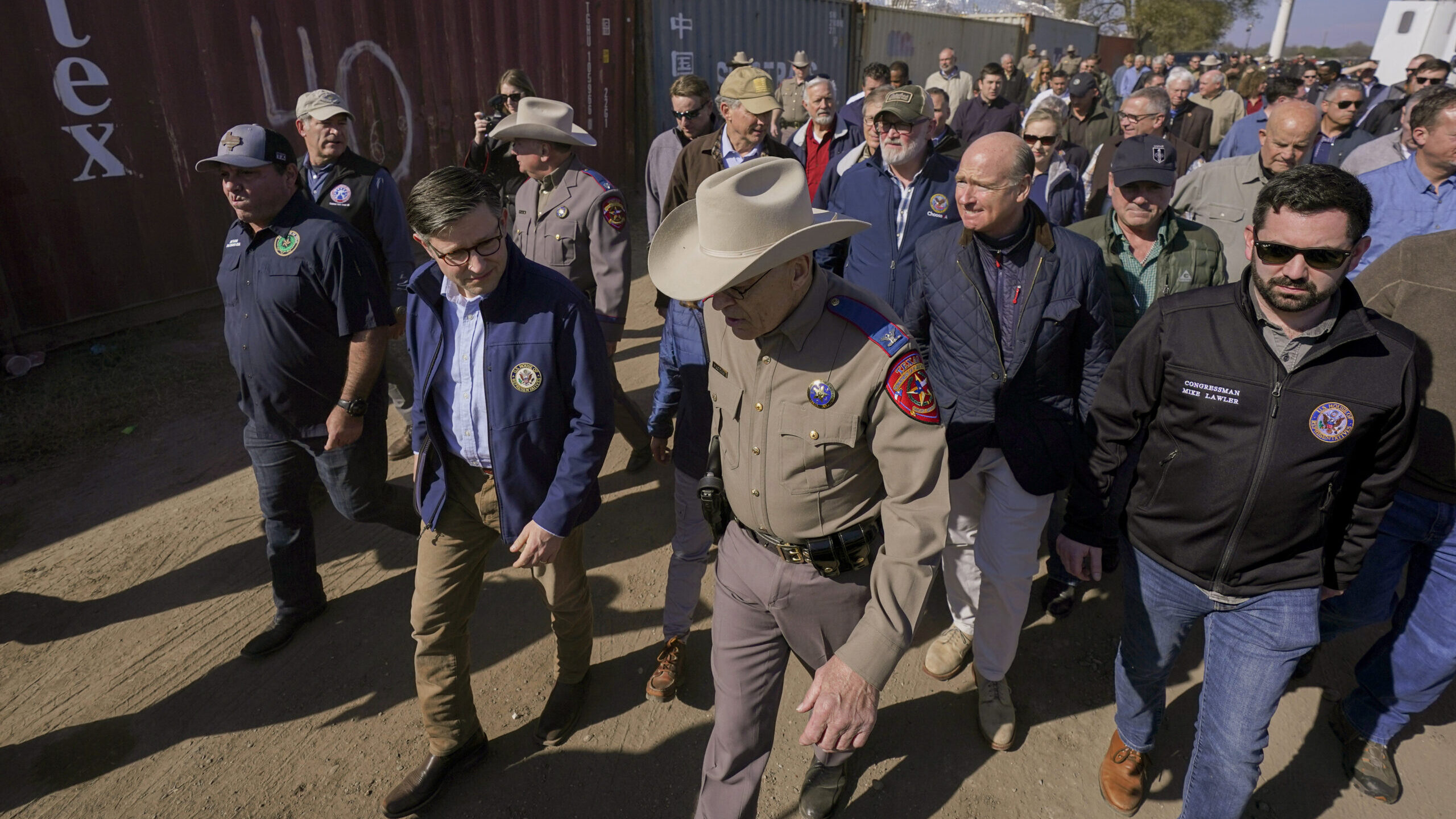 U.S. House Speaker Mike Johnson, center left, and Texas Department of Public Safety chief Steve McC...