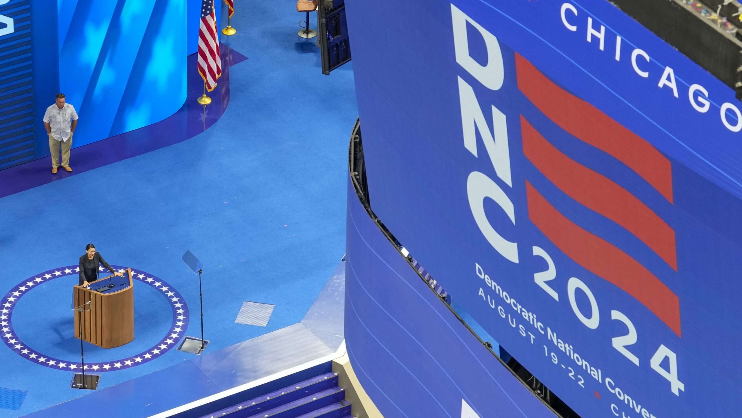 Rep. Alexandria Ocasio-Cortez, D-NY, stands at the podium at the Democratic National Convention at ...