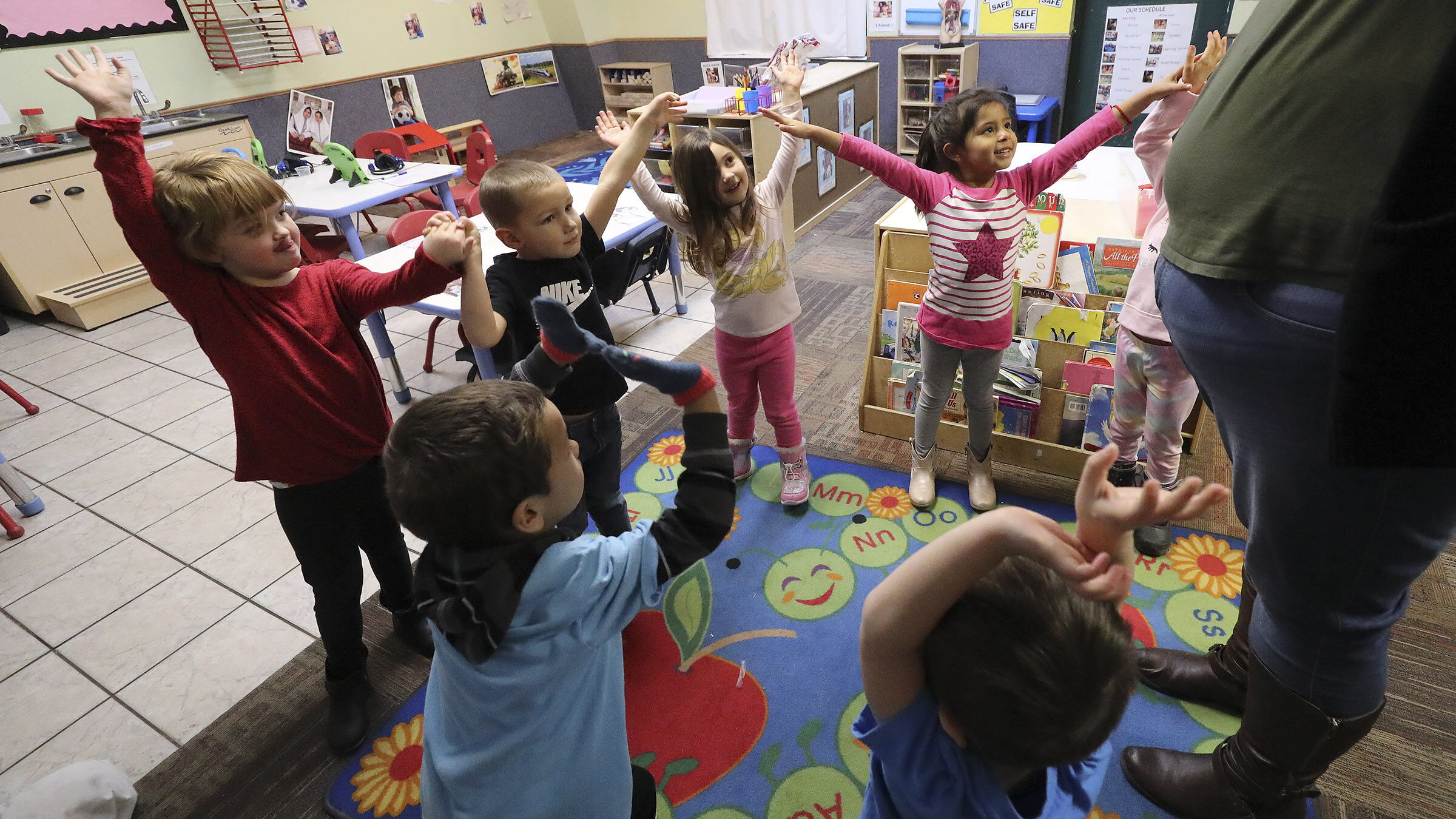 kids play at a child care center in utah...