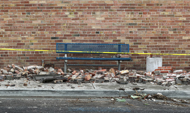 FILE: Caution tape surrounds the VFW building on Magna’s Main Street on Tuesday, March 24, 2020, ...