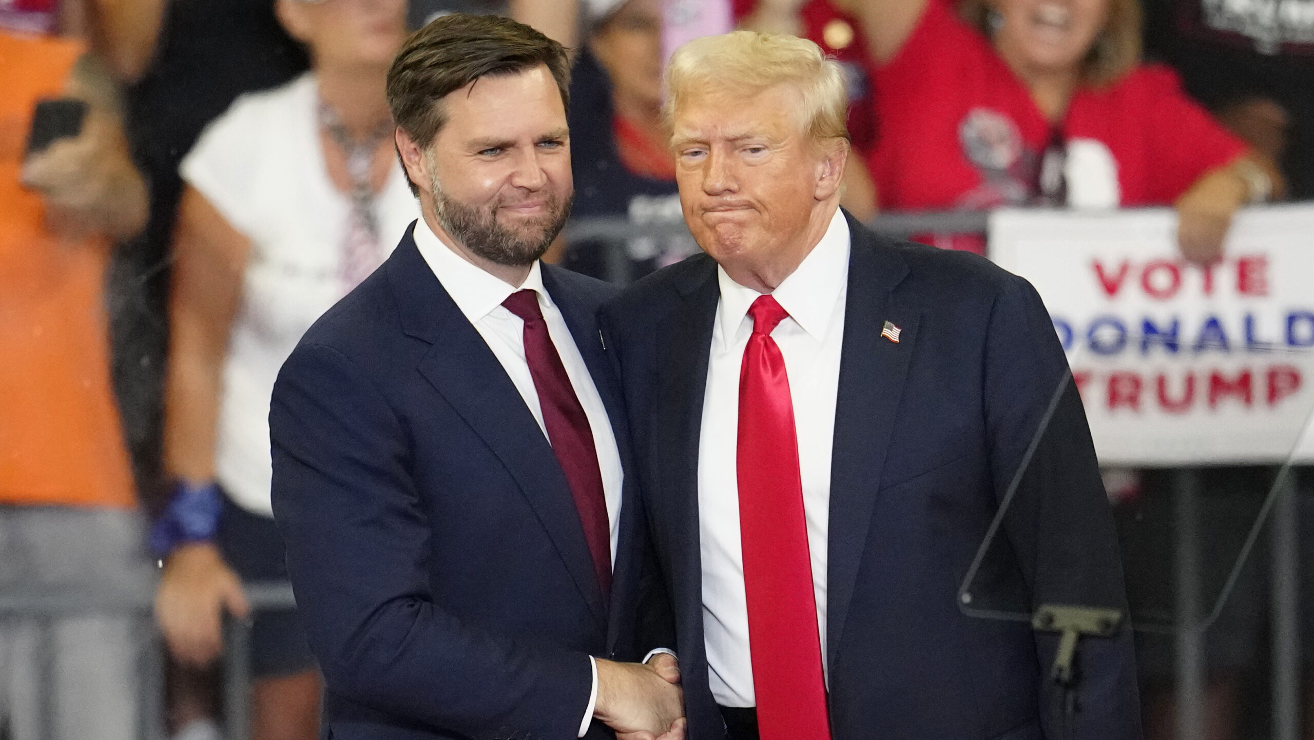 Republican vice presidential candidate Sen. JD Vance, R-Ohio, left, and Republican presidential can...