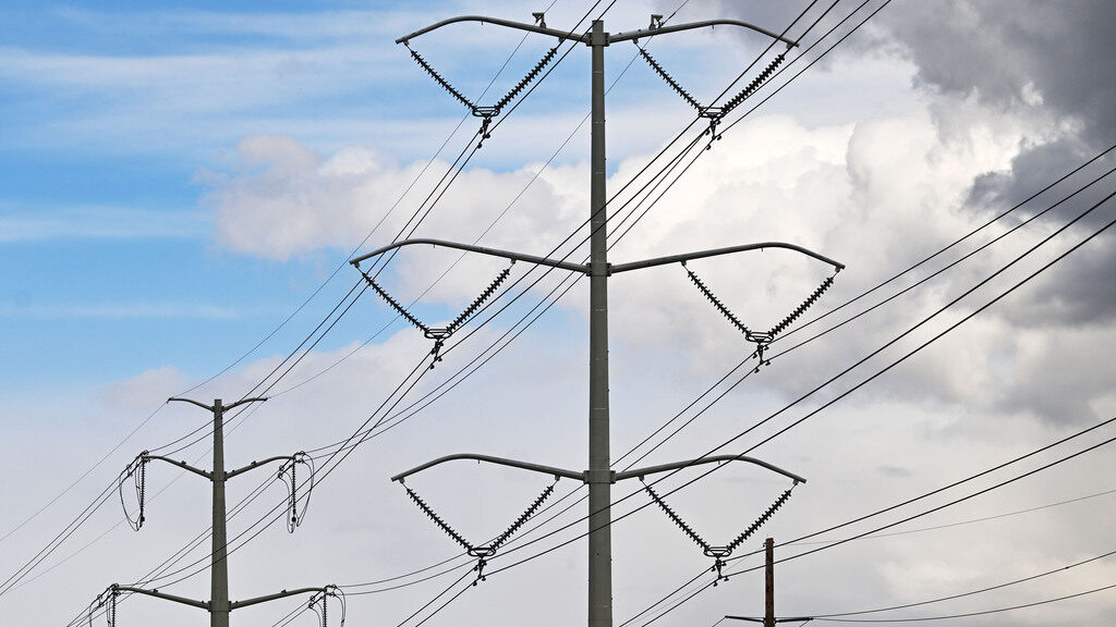 Power lines are seen in Salt Lake City near the international airport on Monday, March 11, 2024. Ro...