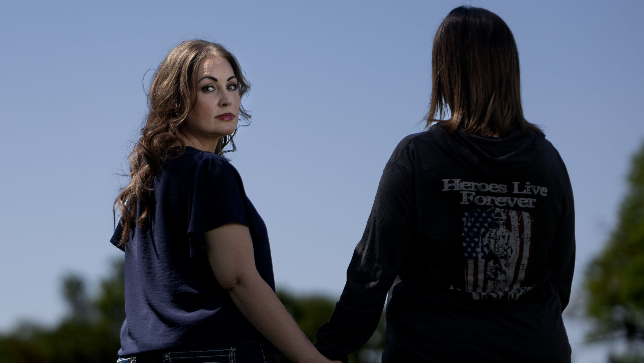 Kristy and Misti, two victims of dating violence, are photographed together in West Jordan....