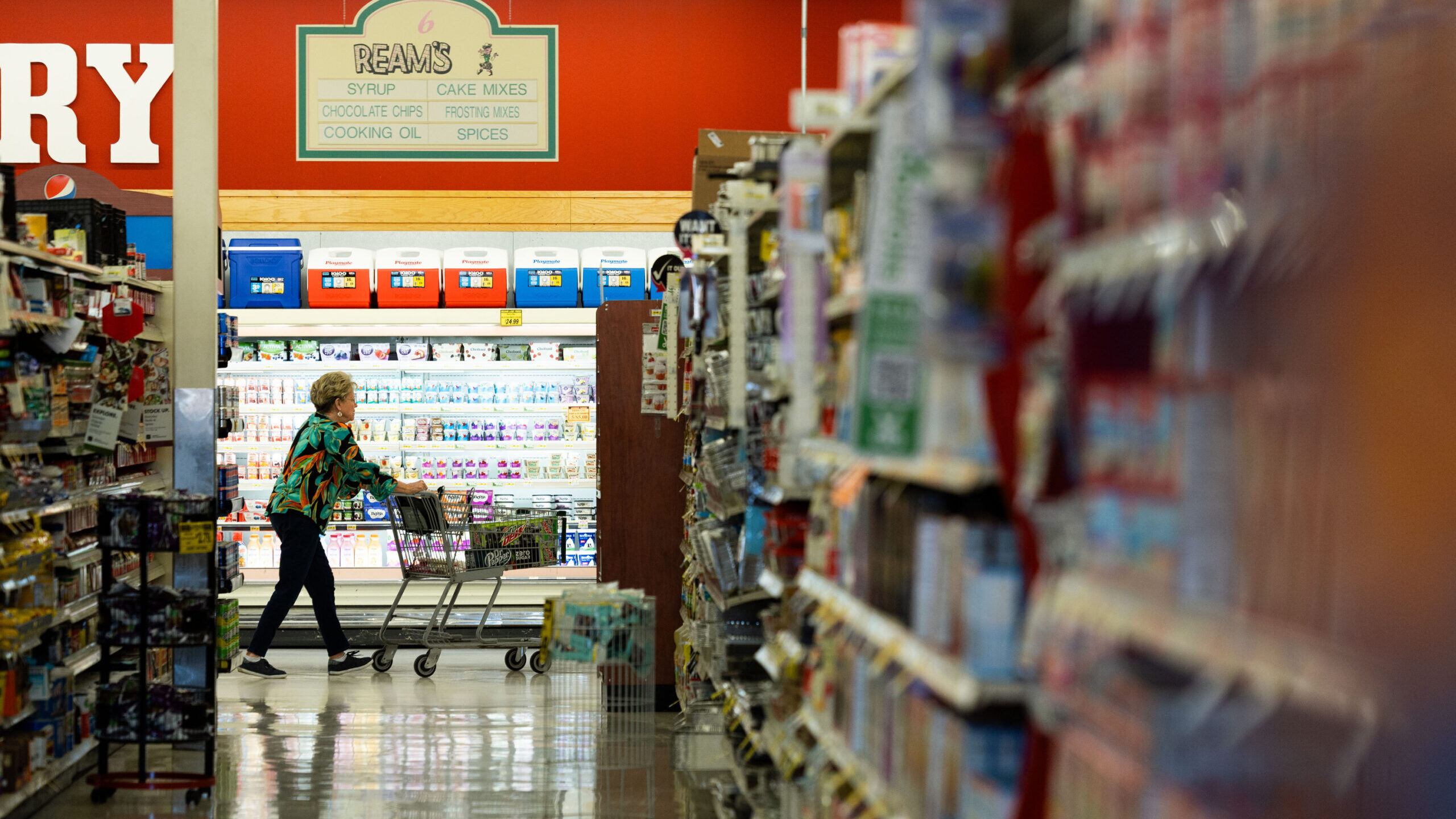 A customer passes by an isle in a grocery store in Utah...