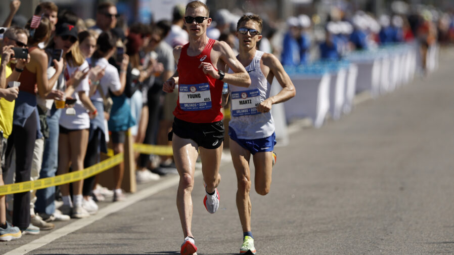 Clayton Young (left) and Conner Mantz run through the course during the 2024 U.S. Olympic Team Tria...