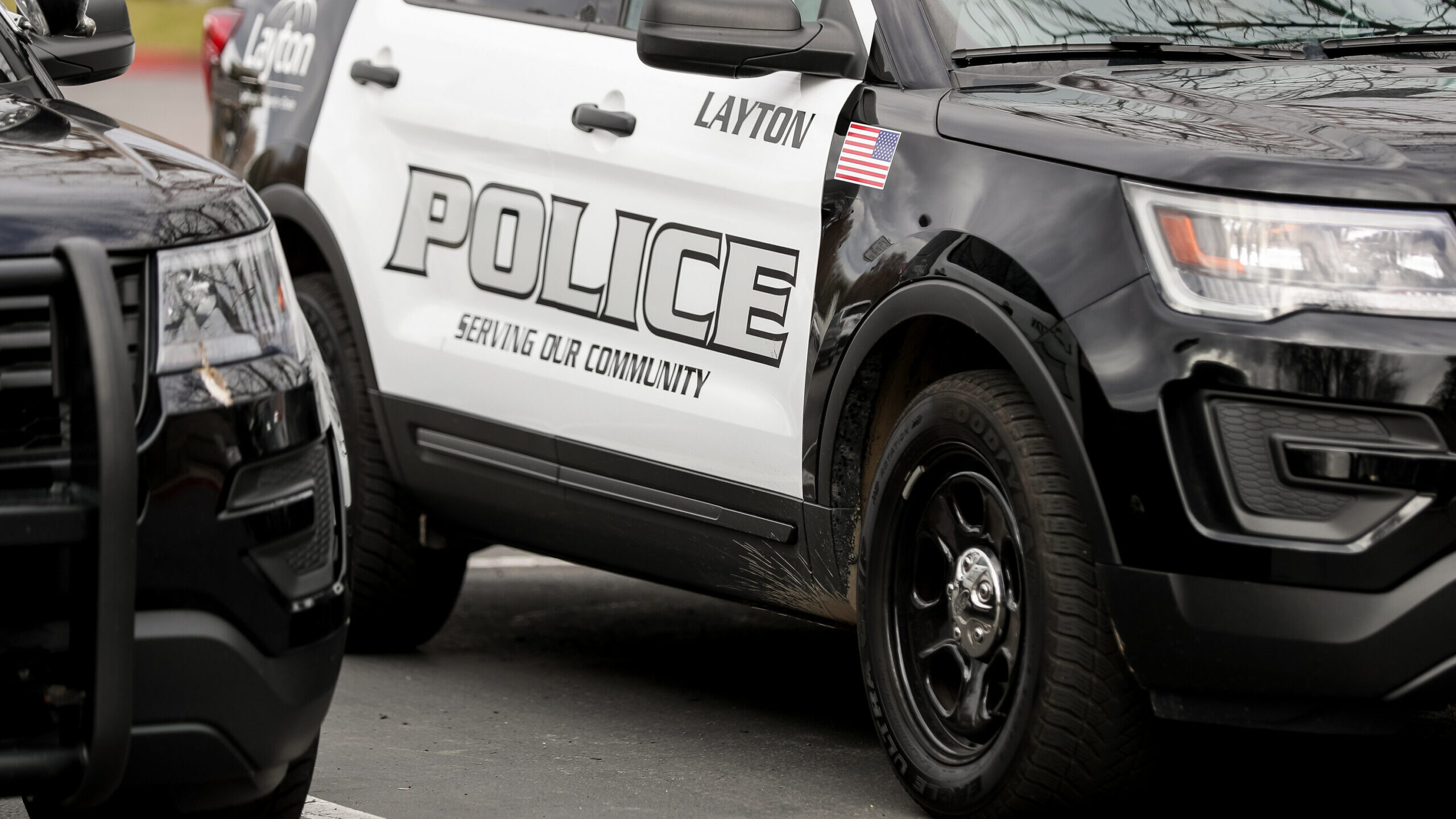 Police cruisers are parked outside the Layton Police Department on Tuesday, March 31, 2020. They re...