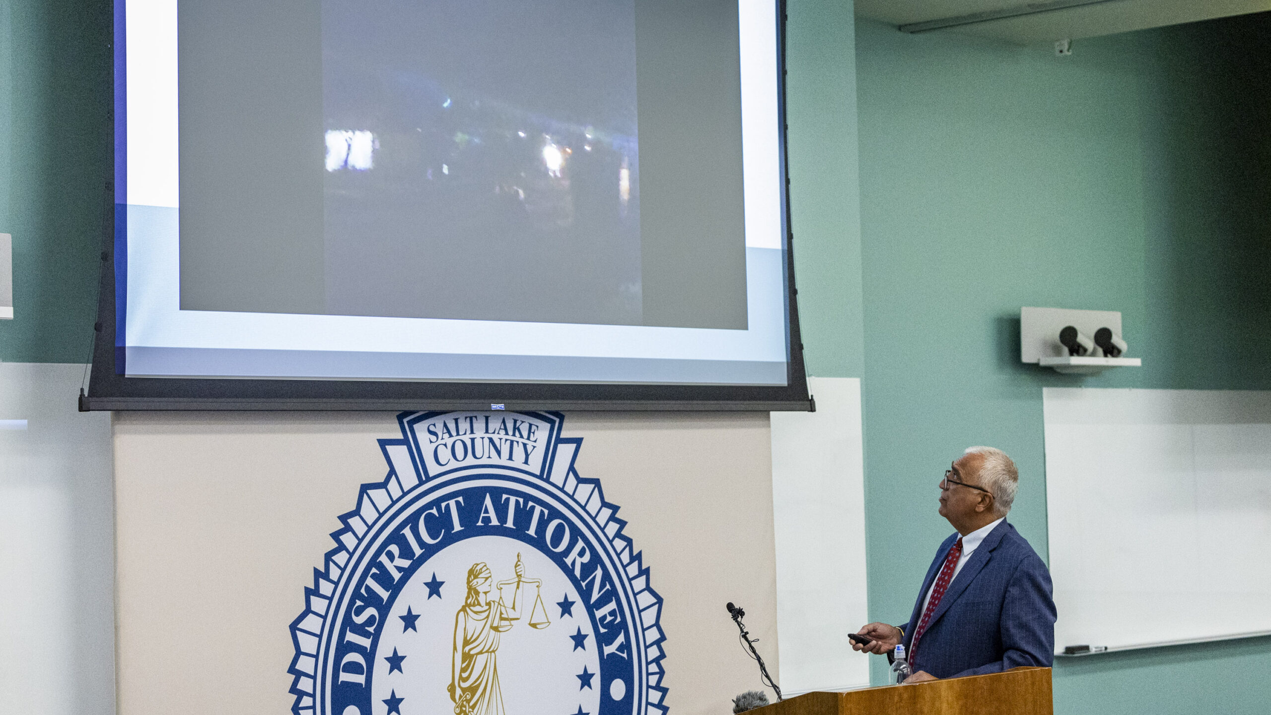 SLCo DA Sim Gill shows a video of a fatal Magna shooting involving officers last November....