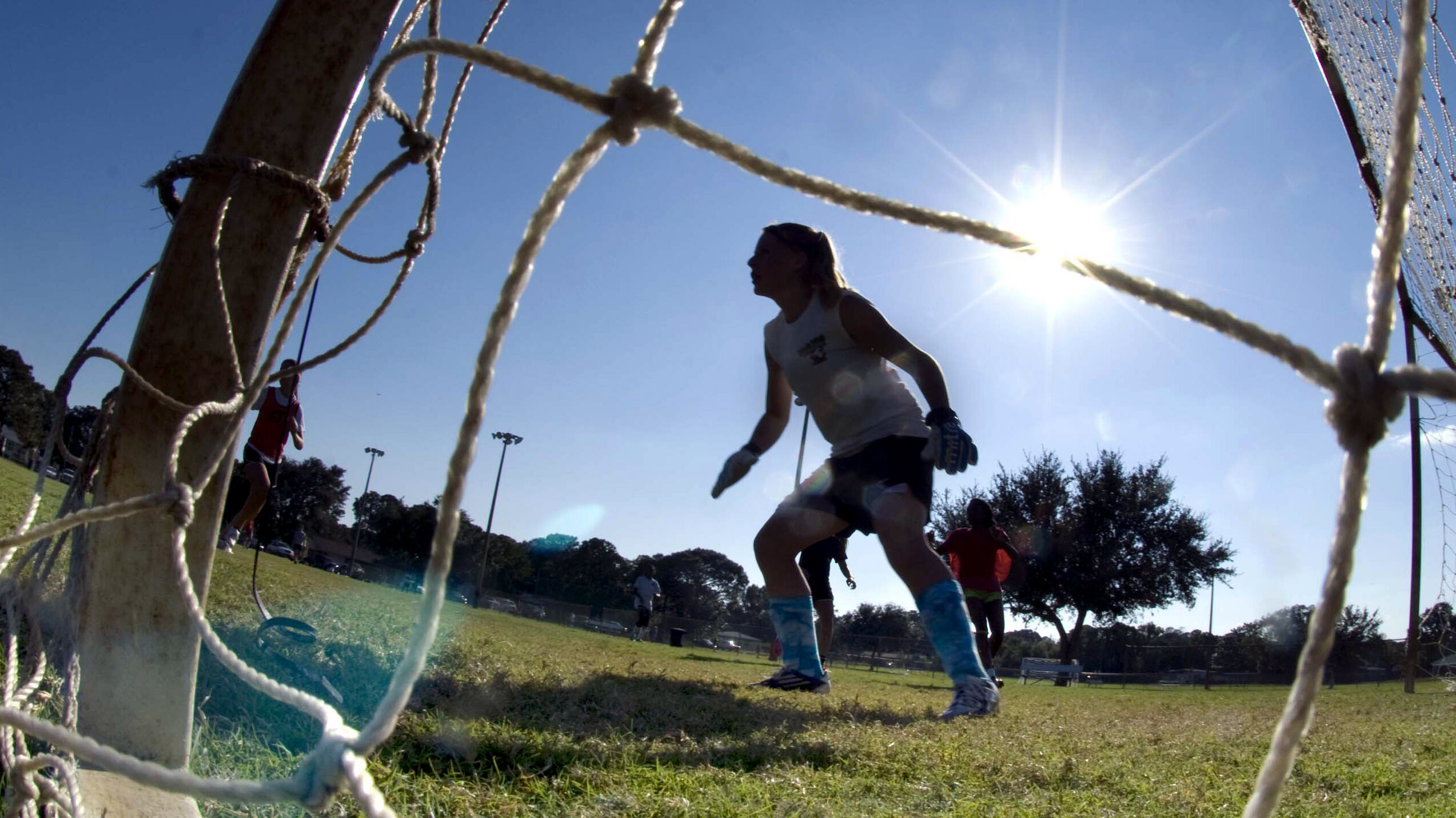 a girl plays soccer...