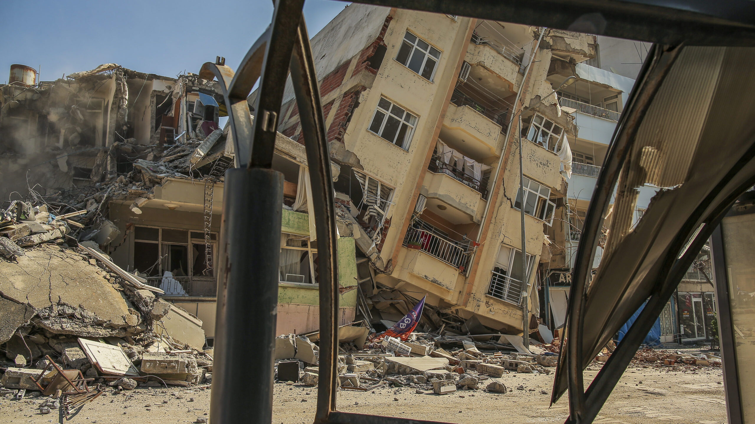 buildings are destroyed following an earthquake...