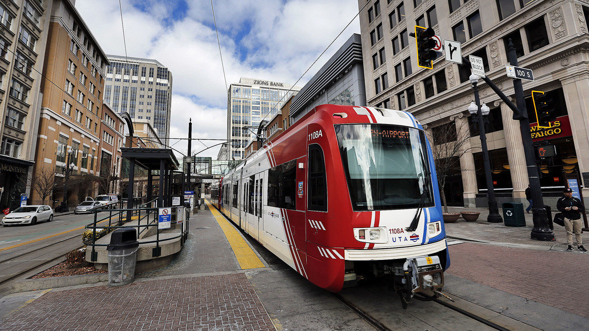 UTA trax train shown, uta offers summer youth pass...