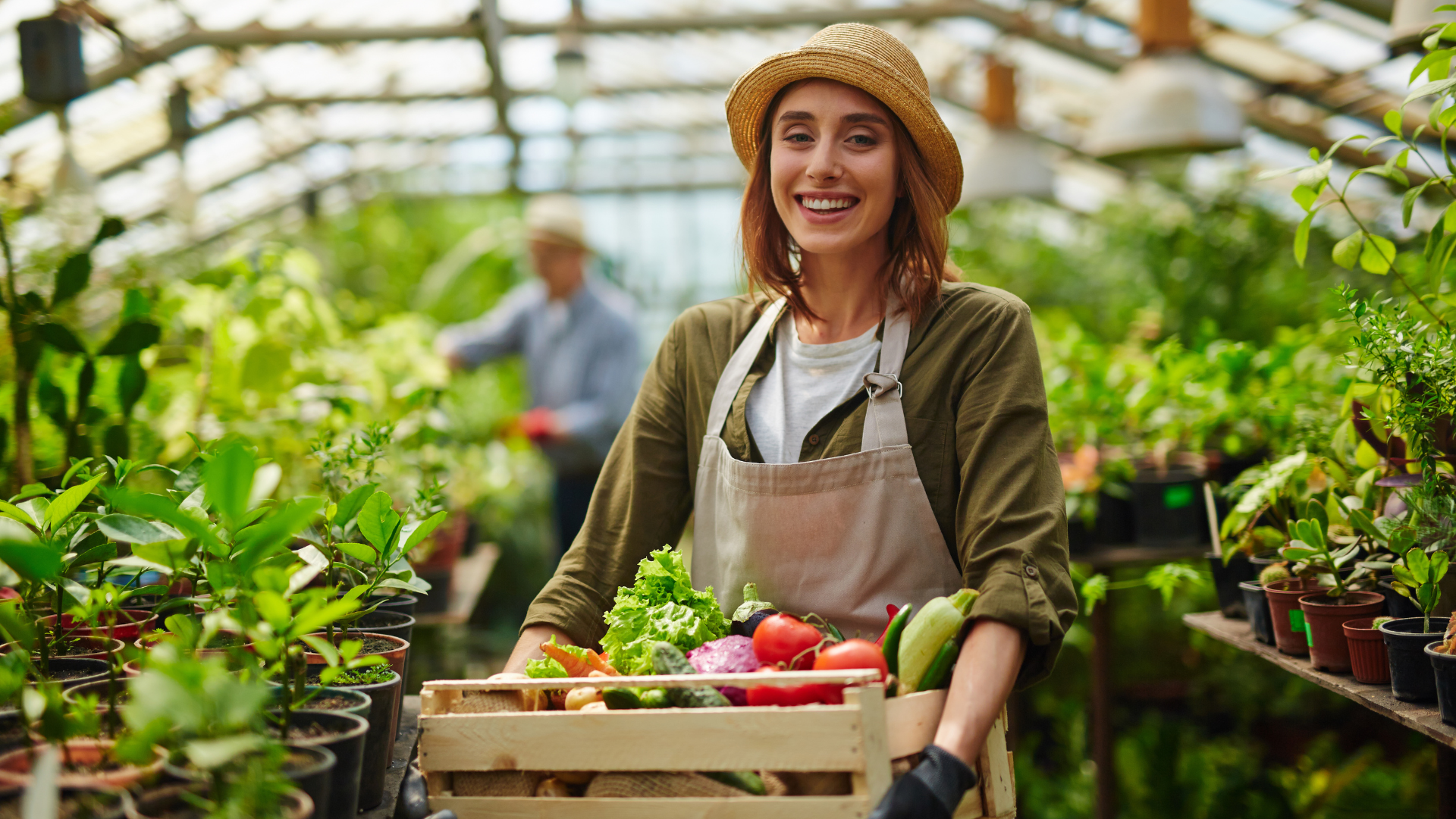 a woman holds a basket of vegetables...