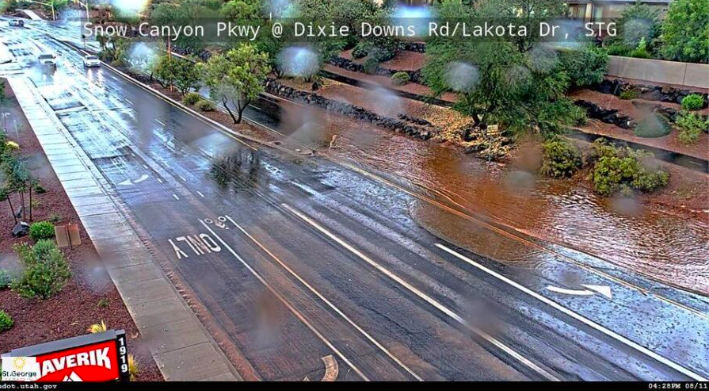 Water is pictured here covering a road in St. George on Sunday, Aug. 11, 2024. Southern Utah has be...